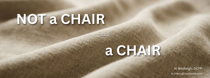 &ldquo;NOT a CHAIR still a CHAIR&rdquo; text over soft fabric folds illustrating attention and negative outcomes.